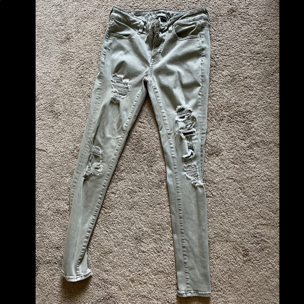 green ripped american eagle skinny jeans size 8